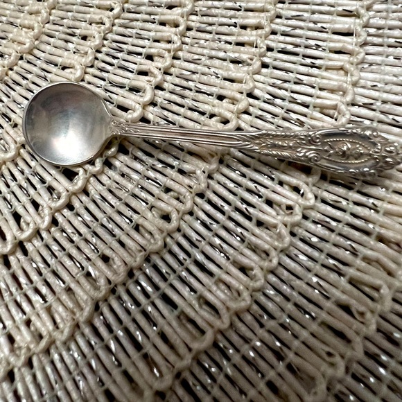 Vintage spoon and a baby ring both are sterling they were black and I cleaned. - Picture 1 of 12